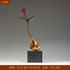 Holding a rose