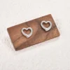 Corazón hueco plateado
