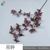 LO en forma de campana de color morado oscuro