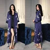 Robe bleu pin et grue