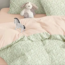 Fashionable Flower  Printed Chemical Fiber Double  Sided Four  Piece Bedding Set