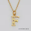 (Gold) letter F (including chain)