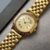 Chaîne à cinq perles dorées avec bracelet en acier
