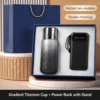 Black titanium-coated thermos mug, power bank