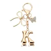 Porte-clés petit papillon doré-K