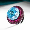 Bague ouverte en or noir et bleu mer