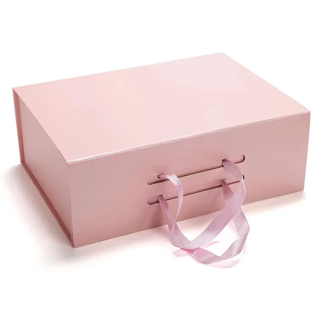 Custom pink magnetic cosmetic paper package box printing cardboard gift packaging box with ribbon handle