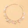 Collar de cadena con estrella de mar y caracola