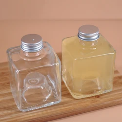 fancy 150ml glass bottles with metal lid for packaging in the stock