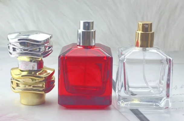 Hot Sale 50ML square Custom Color Red Transparent Perfume Glass Bottle with Flower-shaped Gold and Silver Lid