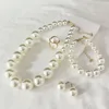 White (ring is ajustable )