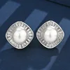 Platinum white pearl stud earrings