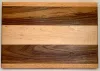Dark walnut stripes alternating with light rubber wood or oak