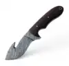 Madera marrón oscuro intenso, pasadores de latón dorado y tubo para cordón.