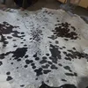 Heavy white base with very fine black/grey sparkles