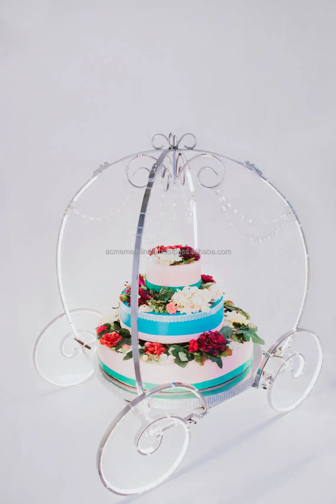 Unique bicycle cake stand with three cakes. White wooden bicycle cake stand  with three cakes, isolated on black. | CanStock