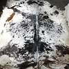 White base with fine Black and Brown speckles