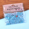 2 bolsas OPP azul y blanco con cuentas de arroz