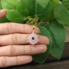 3.Ojo de Gato Rosa con Circonita Negra