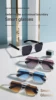 Silver frame with black lenses