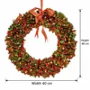 Una baya roja con hojas verdes.40cm
