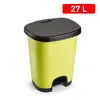 Yellow bucket with black lid