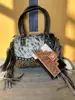 black with brown embossed print