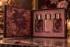 Cereza negra, rosa empolvado y oro suave