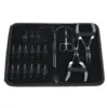 Kit de herramientas para extensiones de cabello negro.