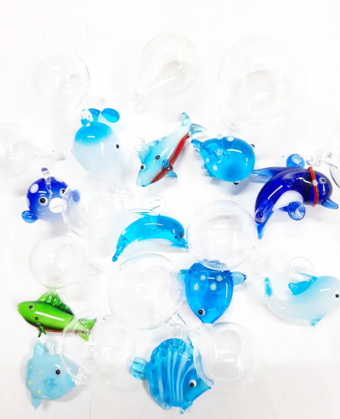 Маленькие морские стеклянные фигурки животных