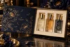 midnight navy with antique gold foil and warm ivory interior
