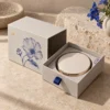 Warm stone with cobalt flower art