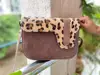 Brown with animal print