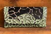 Black With Green Embossed Print