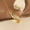 1. White Chalcedony with Emerald CZ Eye