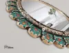 Miroir mural bleu sarcelle à motifs floraux