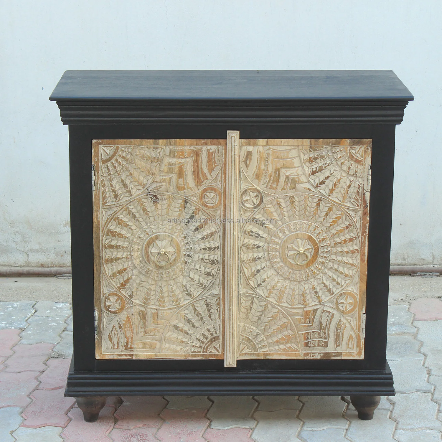 Carved wood accent cabinet