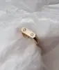 Oro macizo 18K