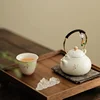 Small handle teapot with two cups-like deep cup-storage bag