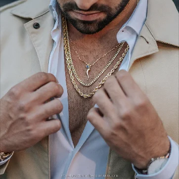 men wearing gold chain