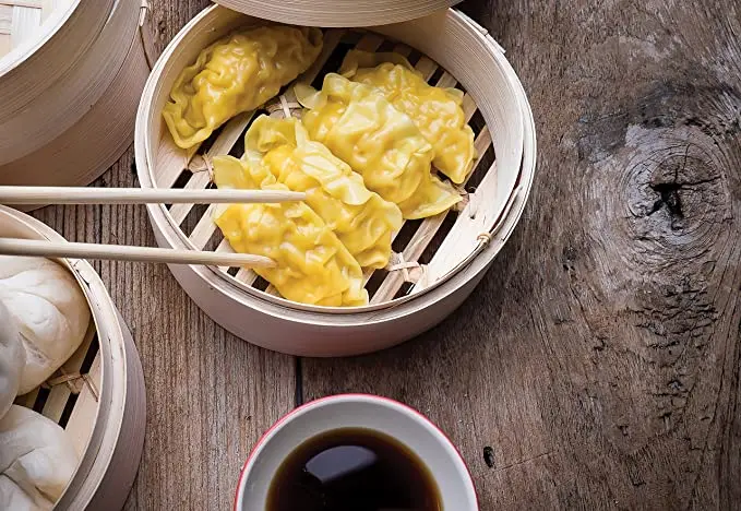 Элегантный круглый отпариватель с димсумом из дерева премиум-класса натуральным отделением идеально подходит для приготовления на пару Момо и Пельменей