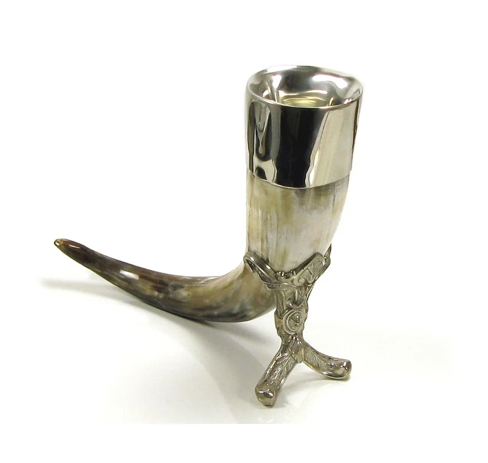 drinking horn with shiny metal designer stand
