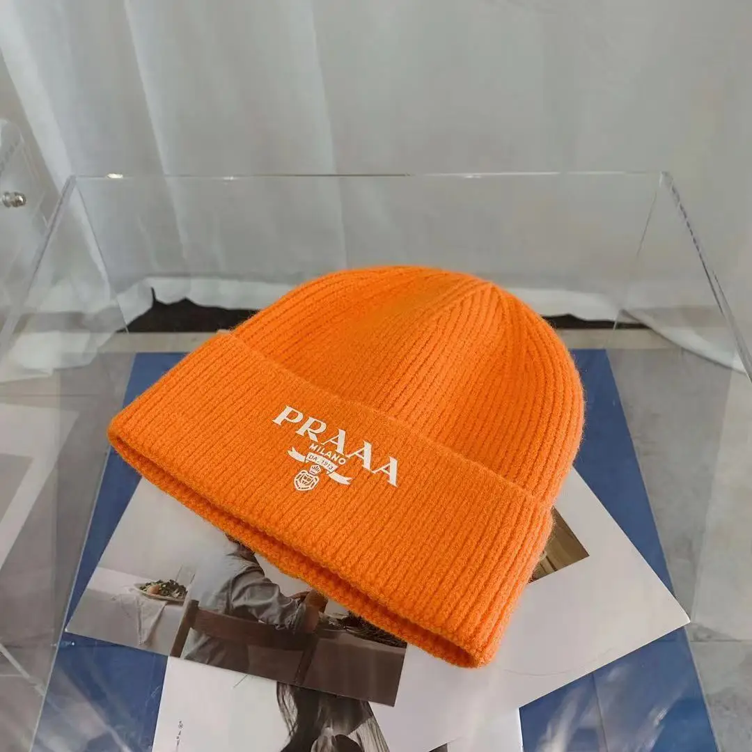 orange designer beanie