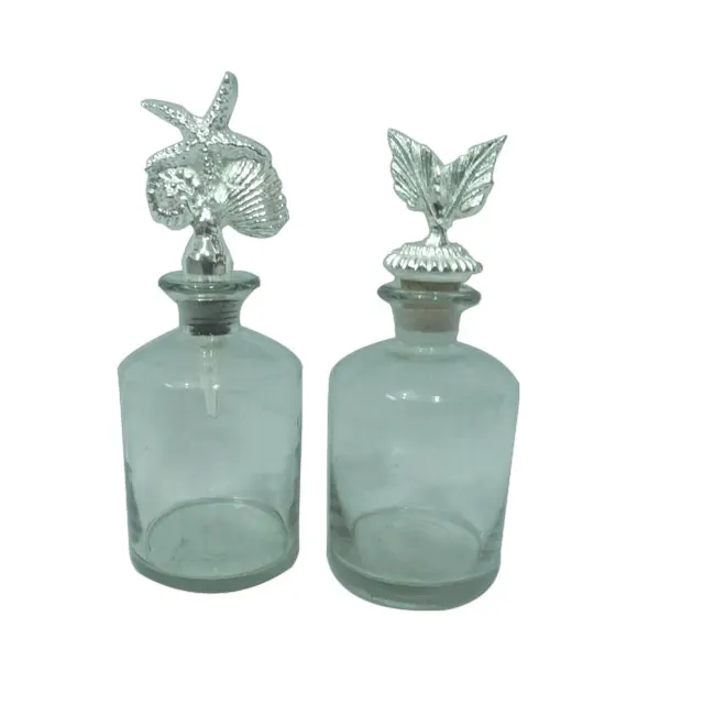 Top Trending Handmade Engraving Glass Perfume Bottle Round Shape Luxury Packaging for Cosmetic Stores