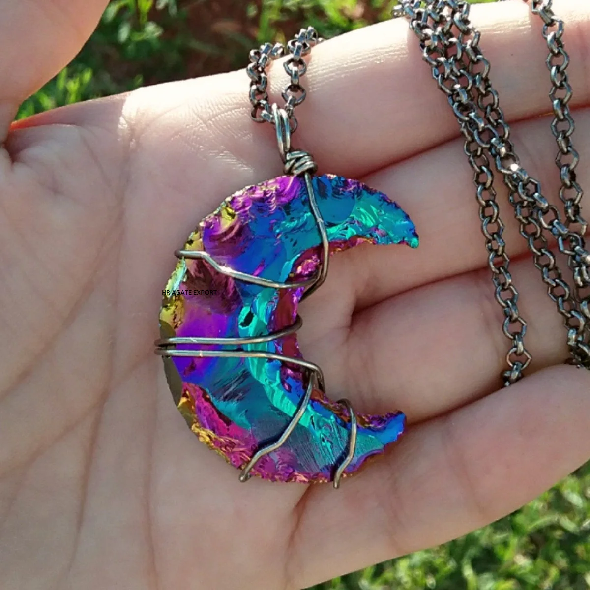 wire wrapped angel aura moon necklace.