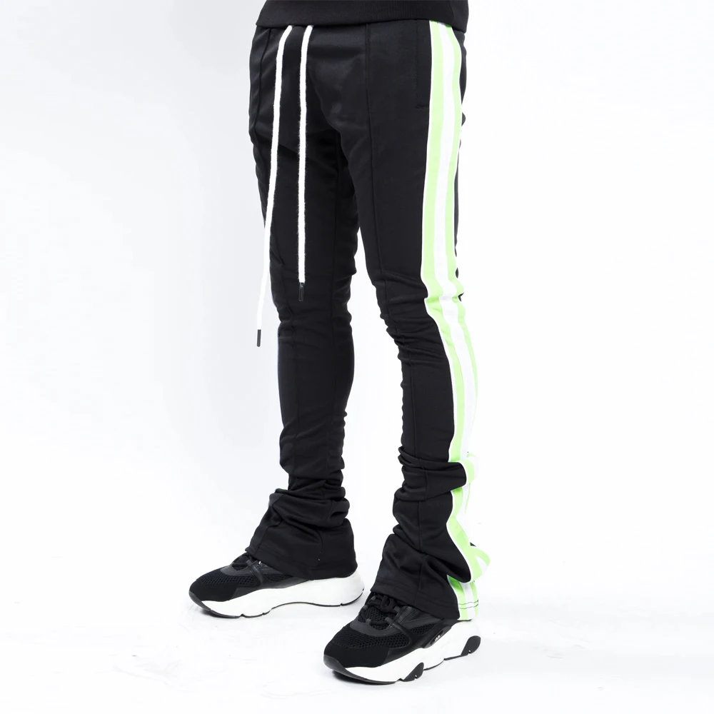 black pants with lime green stripes