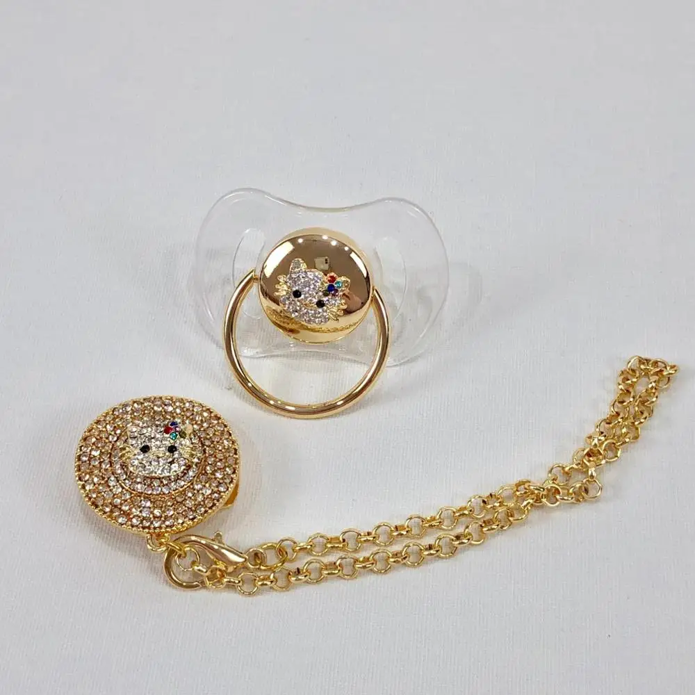 gold baby pacifier
