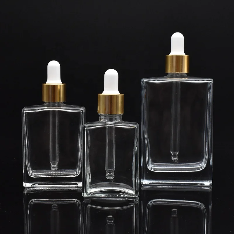 high-end square clear glass dropper bottles 30ml 50ml 100ml rectangle glass dropper bottles with gold cap for essential oil