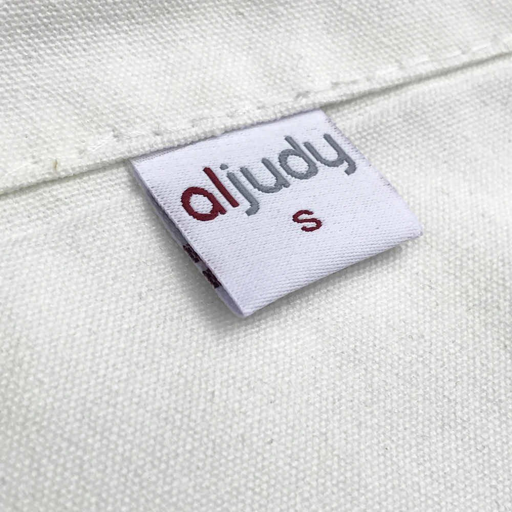 
 Оптовая продажа центр раза одежды тканые этикетки Индивидуальные основные этикетки для брюки и джинсы  