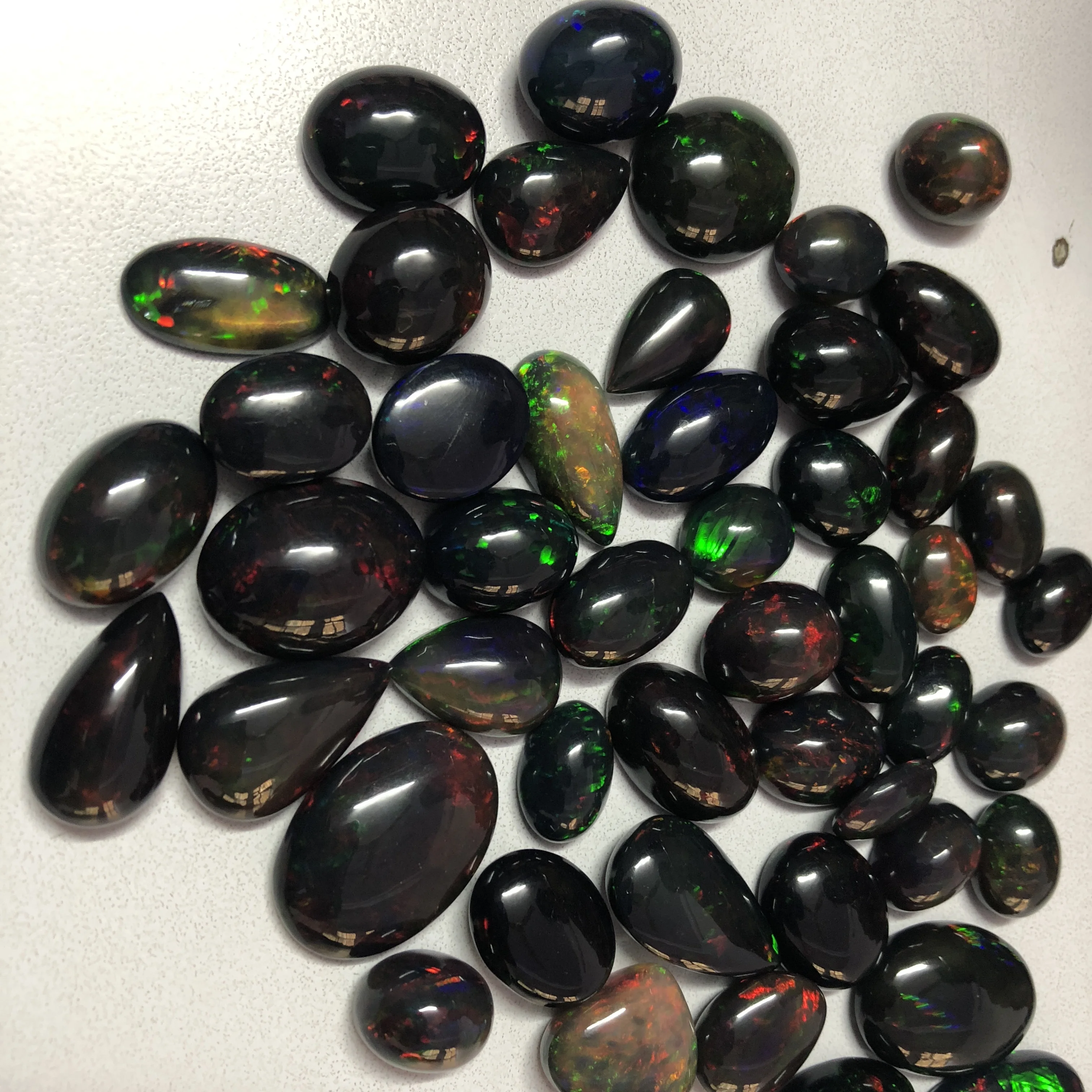 Natural Ethiopian Black Opal 1.12 Carat 8x8 MM Trillion Shape Cabochon Gemstone Color Dye
